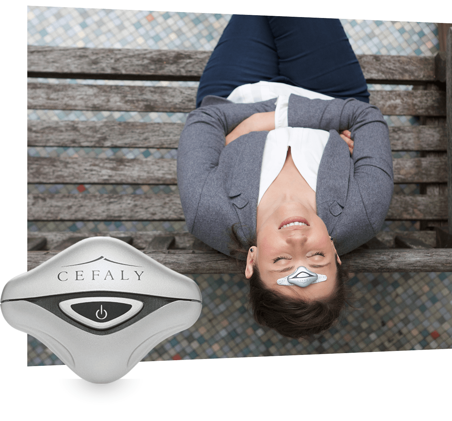 Woman resting on a park bench wearing a CEFALY migraine device