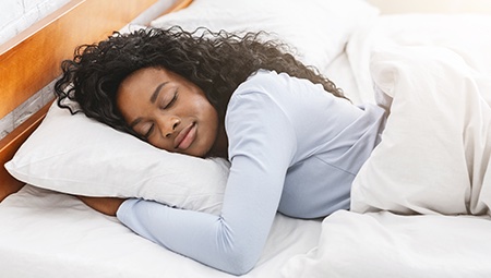 Woman happily sleeping