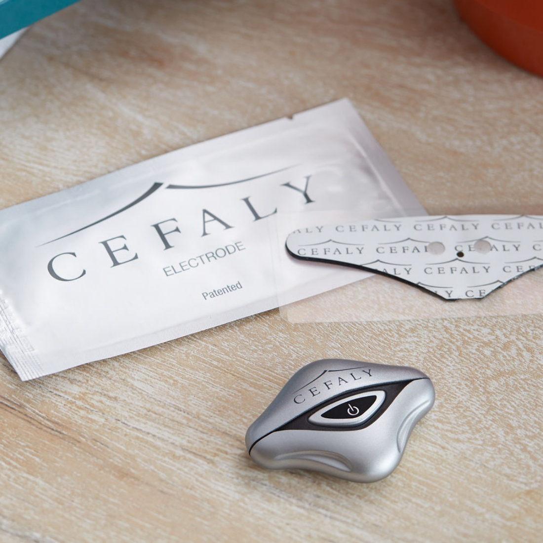  Cefaly Migraine treatment and prevention device with electrode laid out on work desk  4