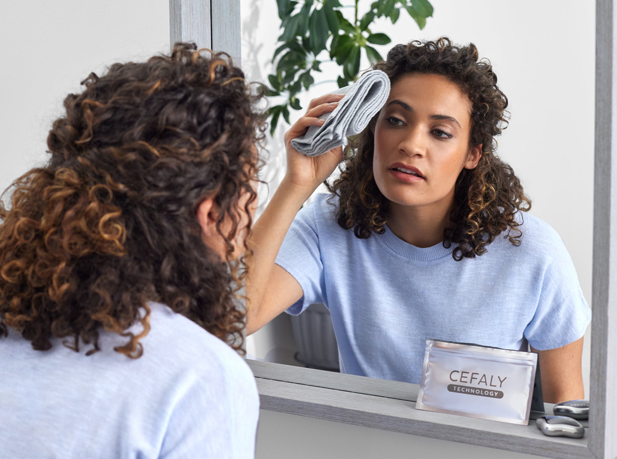 Step 1 illustration - woman cleaning her forehead