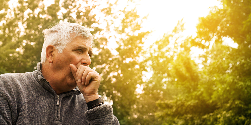 Coughing senior man.