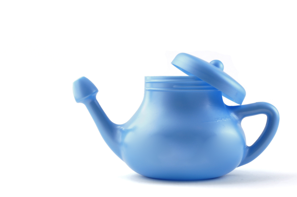A modern plastic, blue Neti Pot